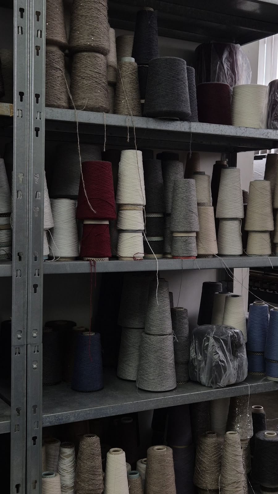 Yarn cones and textile materials